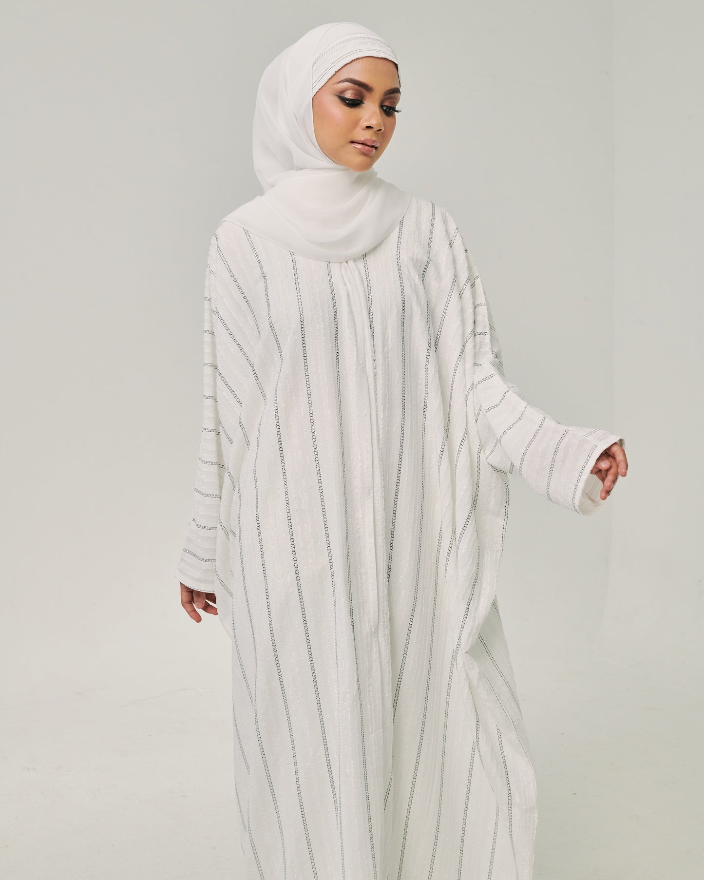 Fateema in Off White